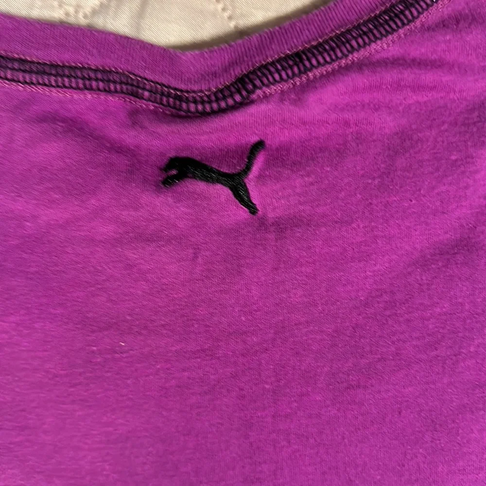 2 tee shirts and pair of shorts shirts are size girls medium. Puma and peanuts. - Picture 11 of 11